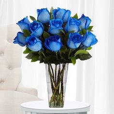 12 Blue Roses In A Vase