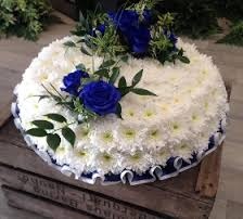 Blue Rose Posy Pad Funeral Flowers
