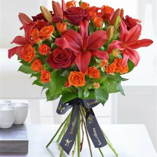 Luxury Red Rose and Lily Handtied with Luxury Champagne